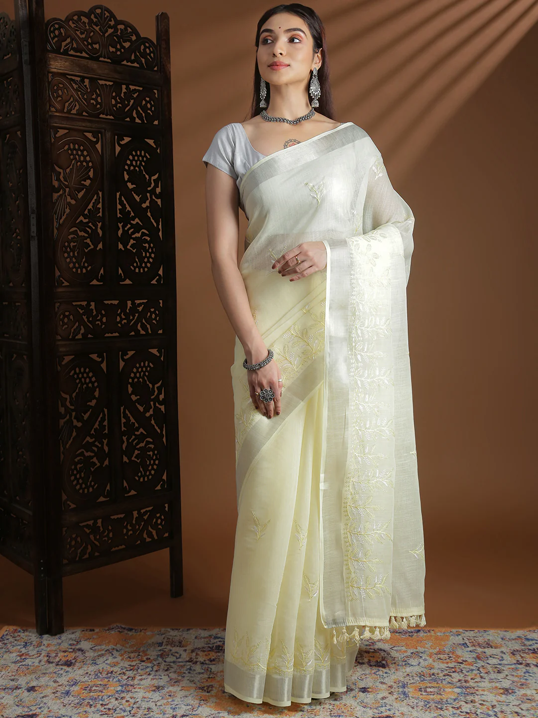 Lemon yellow semi linen embroidered saree online Canada with intricate detailing, perfect for festive occasions.