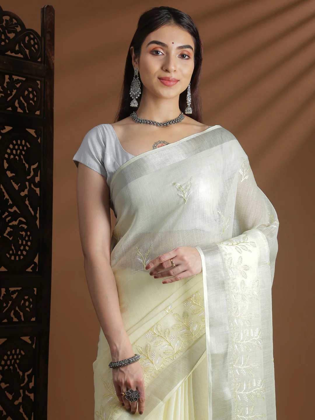 Front view of a lemon yellow semi linen embroidered saree online Canada, perfect for festive occasions.