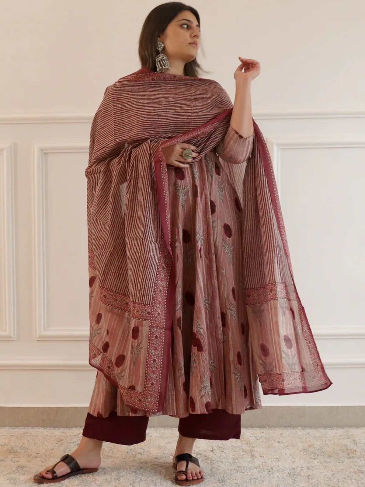 Elegant pink floral anarkali kurta palazzo set by Aromie with a matching dupatta and stylish details