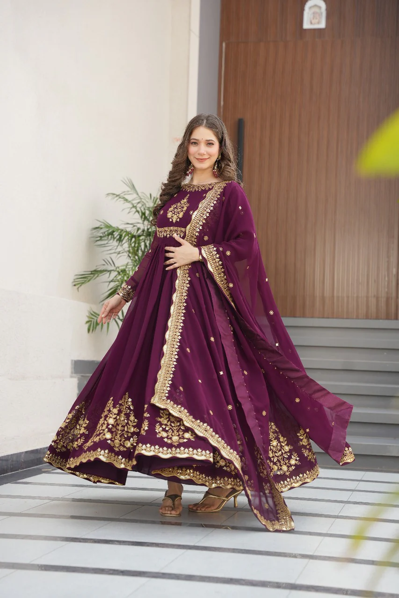 Wine georgette gown with dupatta featuring intricate embellishments, perfect for weddings or festive occasions