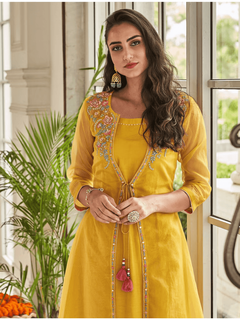 Aromie Viscose Kurti Skirt Set in yellow with intricate embroidery and tassel details