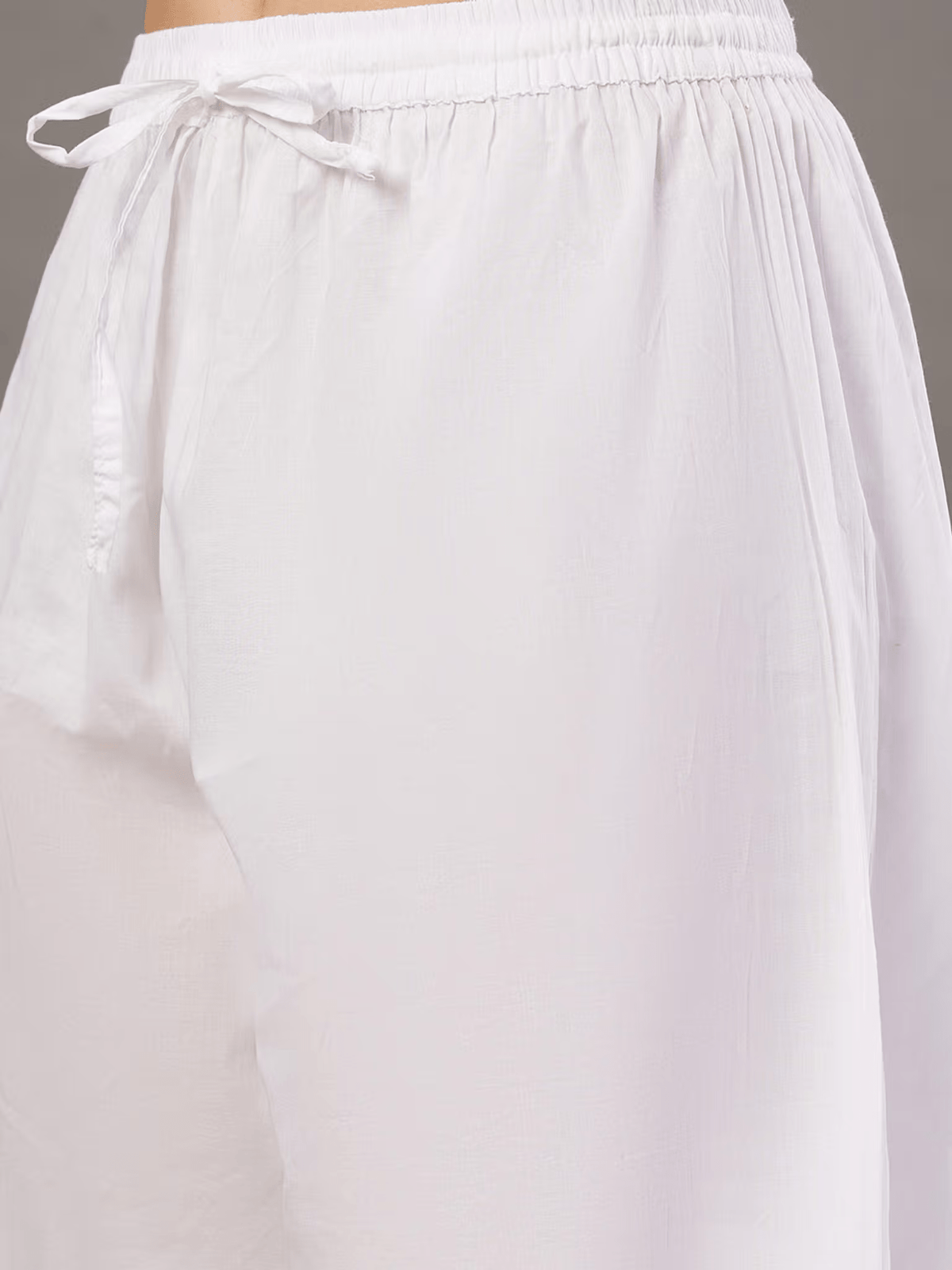 Aromie White Cotton Chikankari Palazzo with a comfortable elastic waistband and drawstring detail