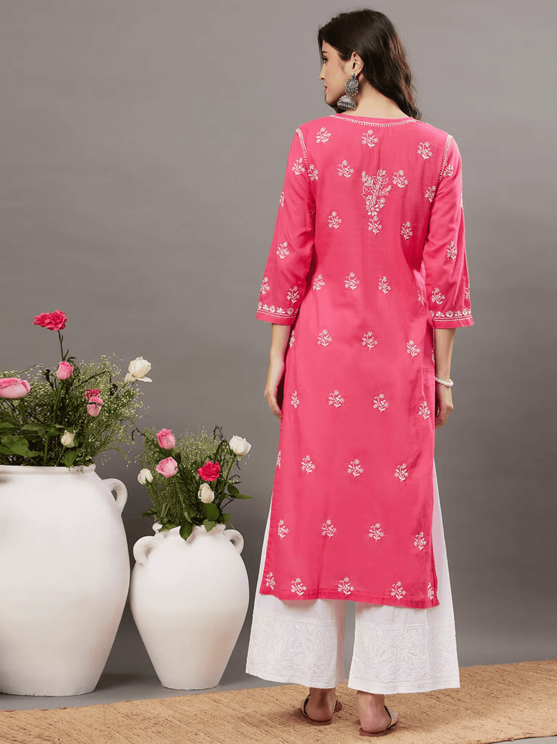 Three piece Kurtha set with a pink top and White Cotton Chikankari Palazzo for stylish ethnic wear