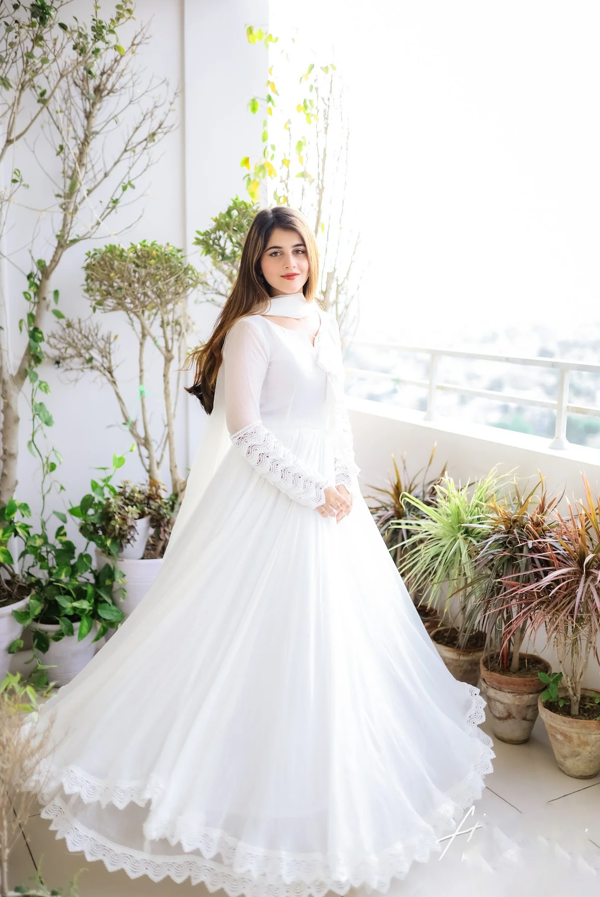 Front view of a white double layered anarkali with dupatta, perfect for weddings and festive occasions