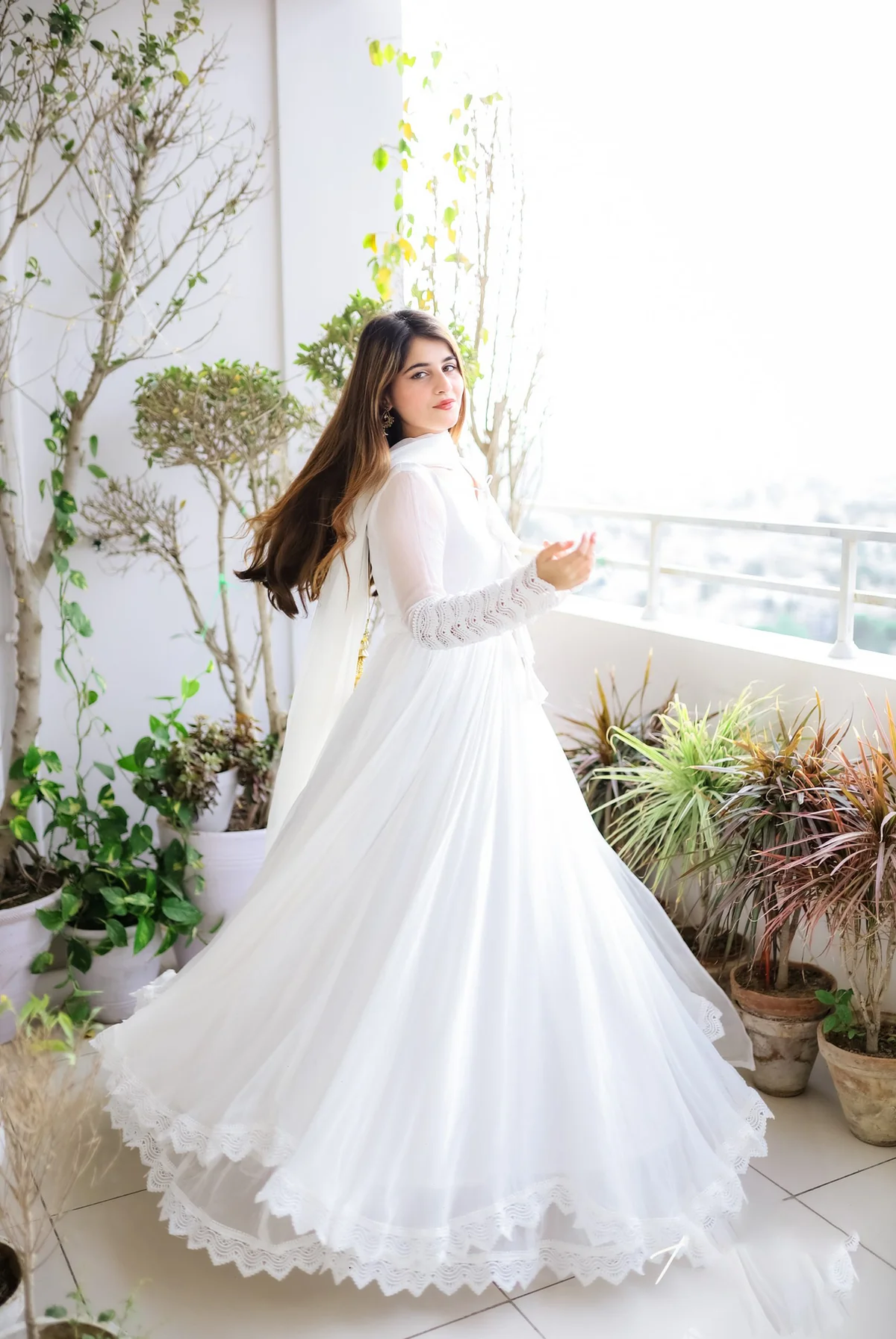 Front view of a white double layered anarkali with dupatta, perfect for weddings and festive occasions