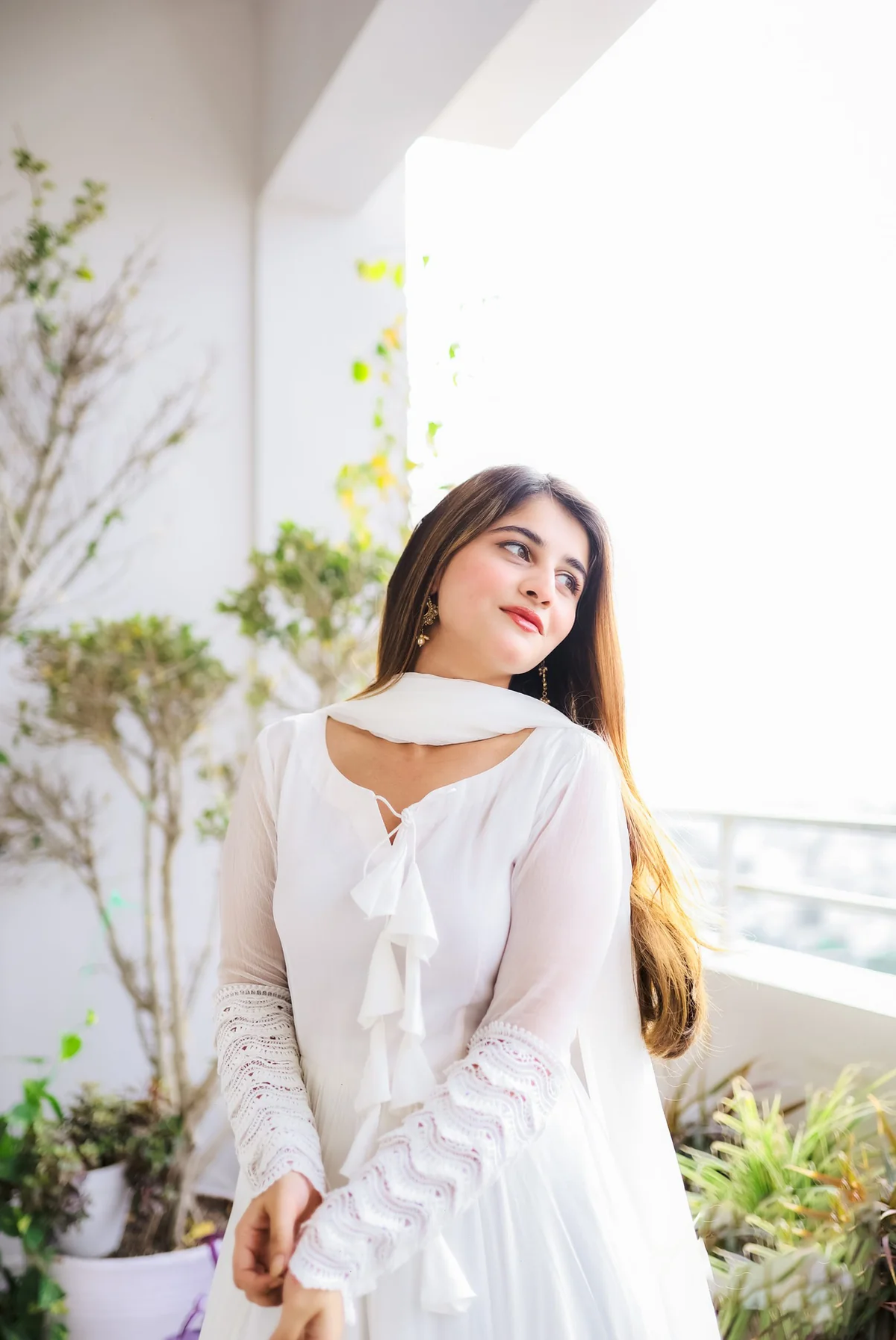 White double layered anarkali with dupatta in front view, perfect for festive occasions and weddings.