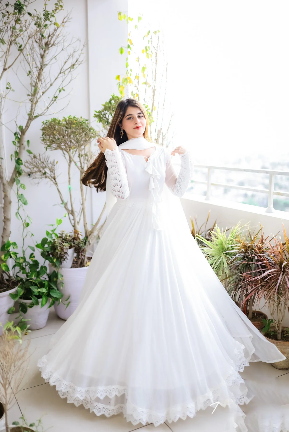 Elegant white double layered anarkali with dupatta, perfect for festive occasions and weddings