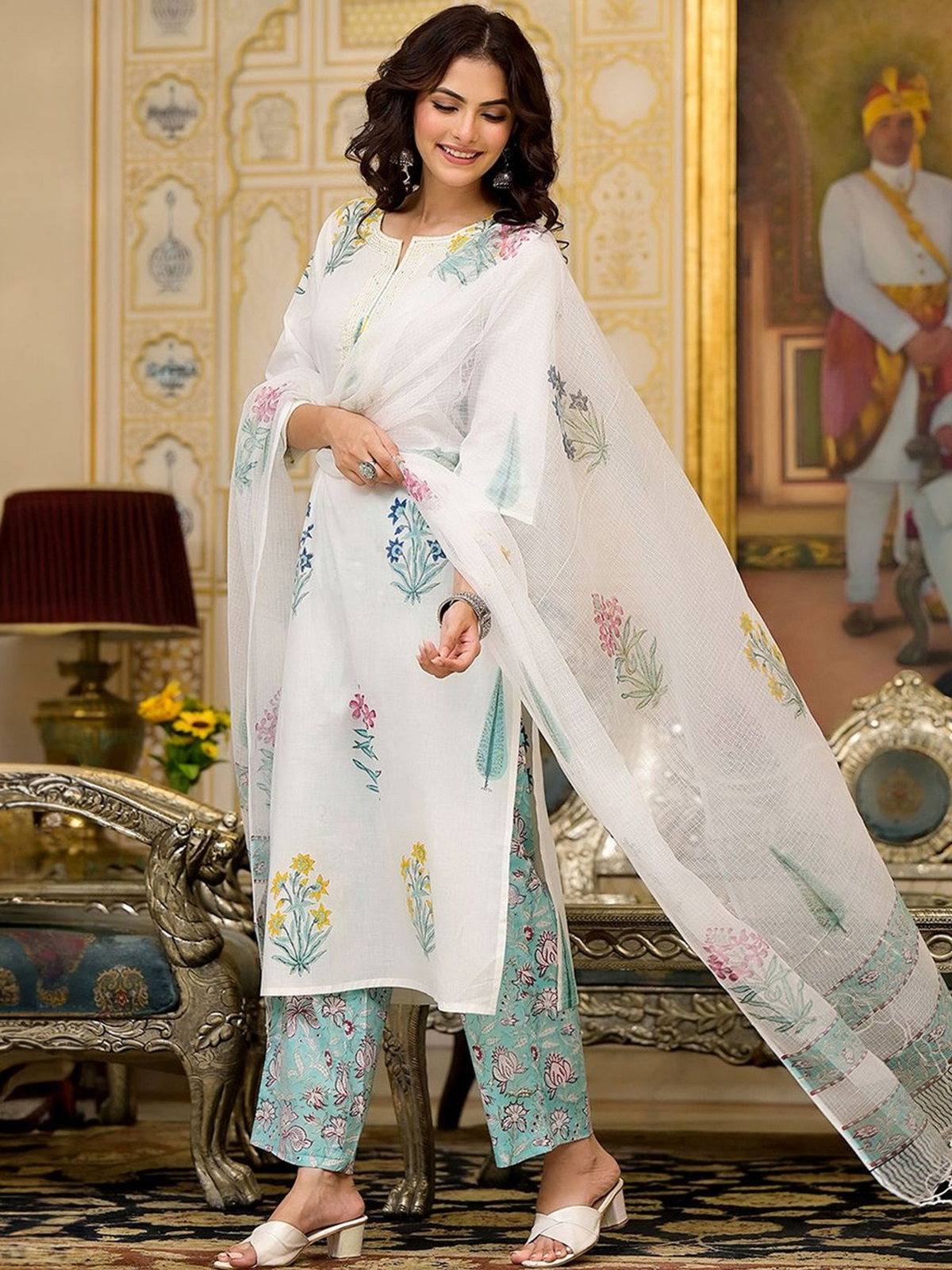 Elegant white printed kurta trouser set with dupatta, featuring floral designs, perfect for festive occasions