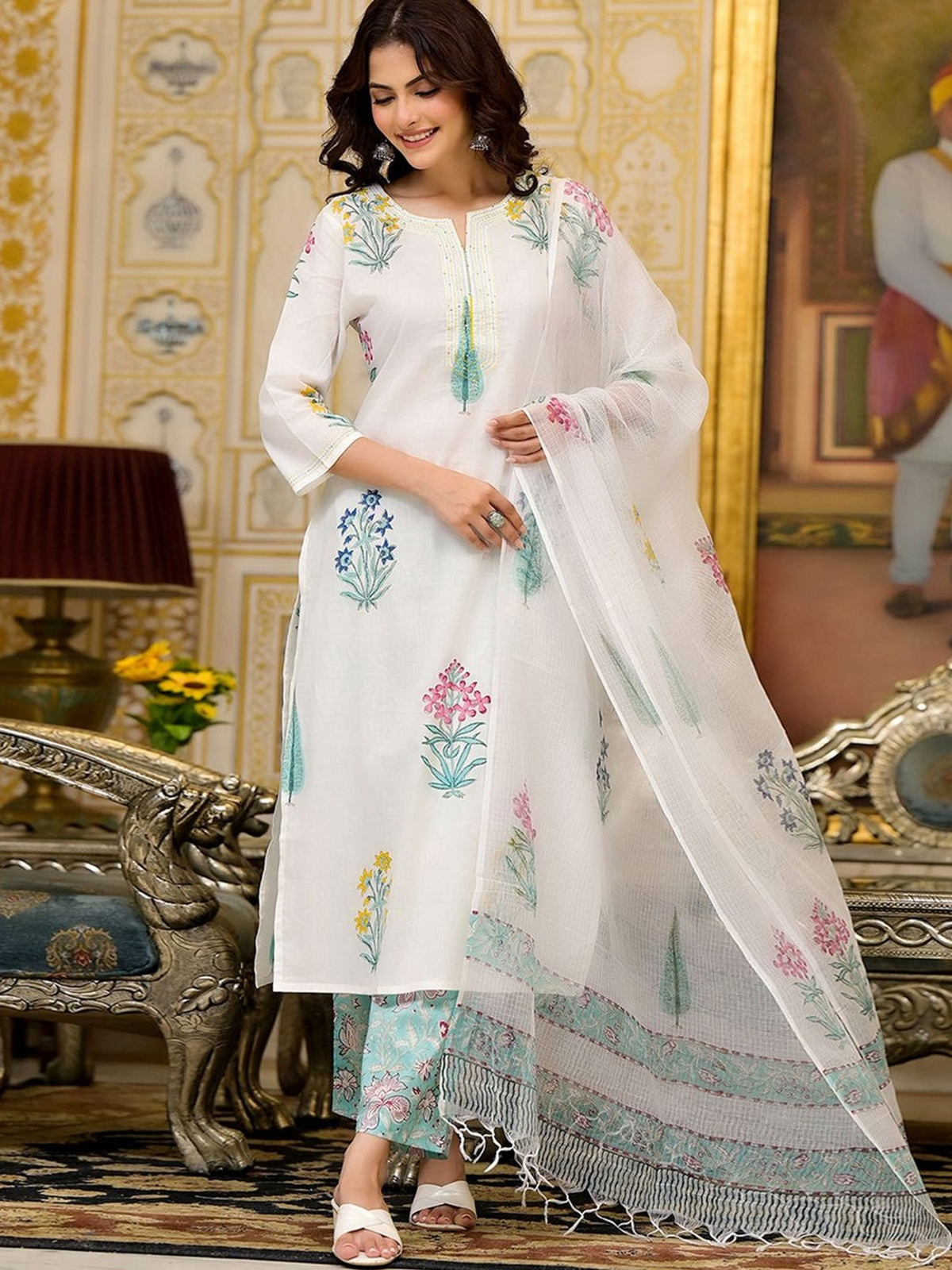 Front view of a white printed kurta trouser set with dupatta, detailed floral patterns, perfect for festive occasions