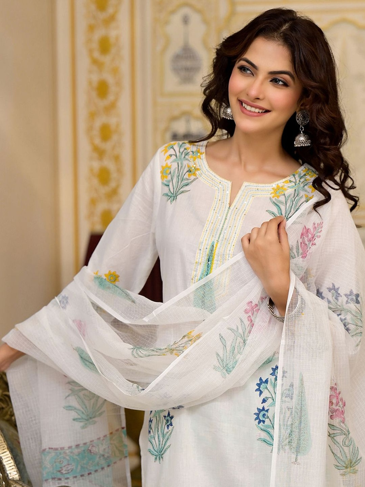 White printed kurta trouser set with dupatta in lightweight fabric, detailed floral embroidery for festive occasions
