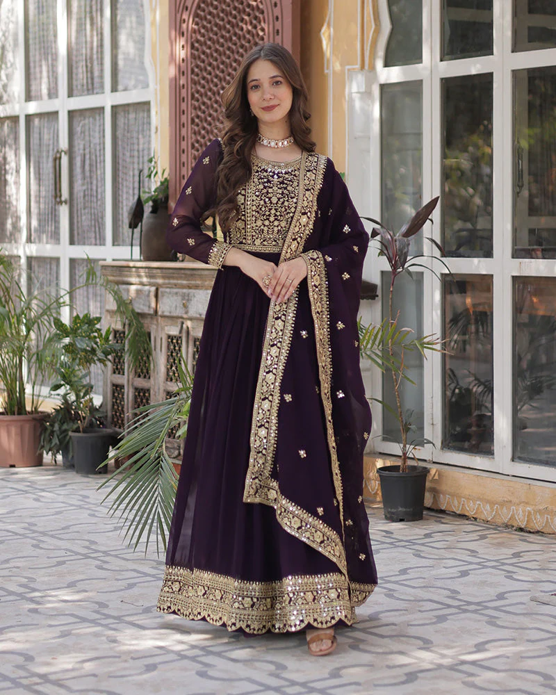 Wine embroidered gown with dupatta from Aromie, featuring intricate detailing, ideal for festive occasions.