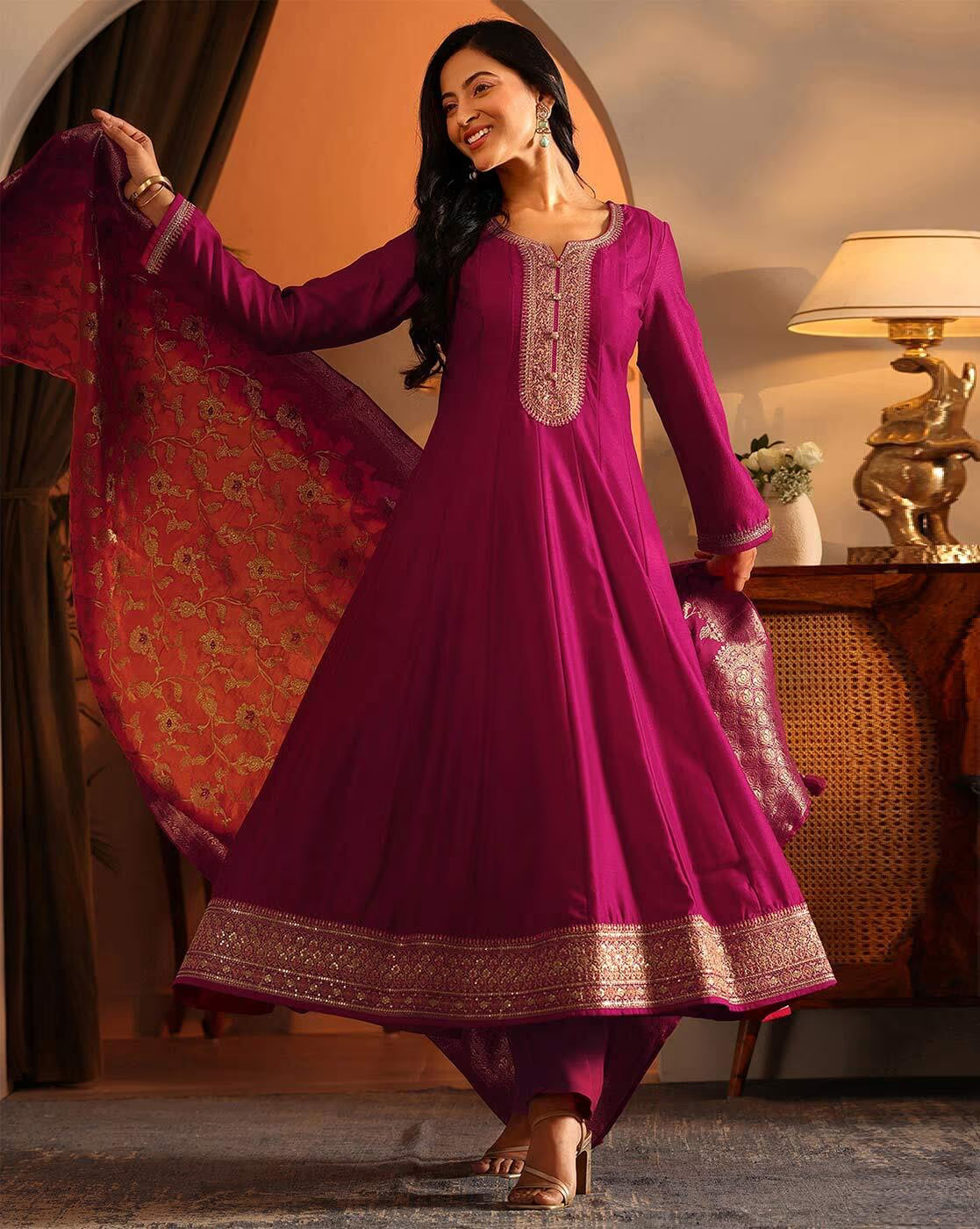 Women embroidered anarkali suit set in rich magenta with elegant embroidery and flowy design for stylish occasions