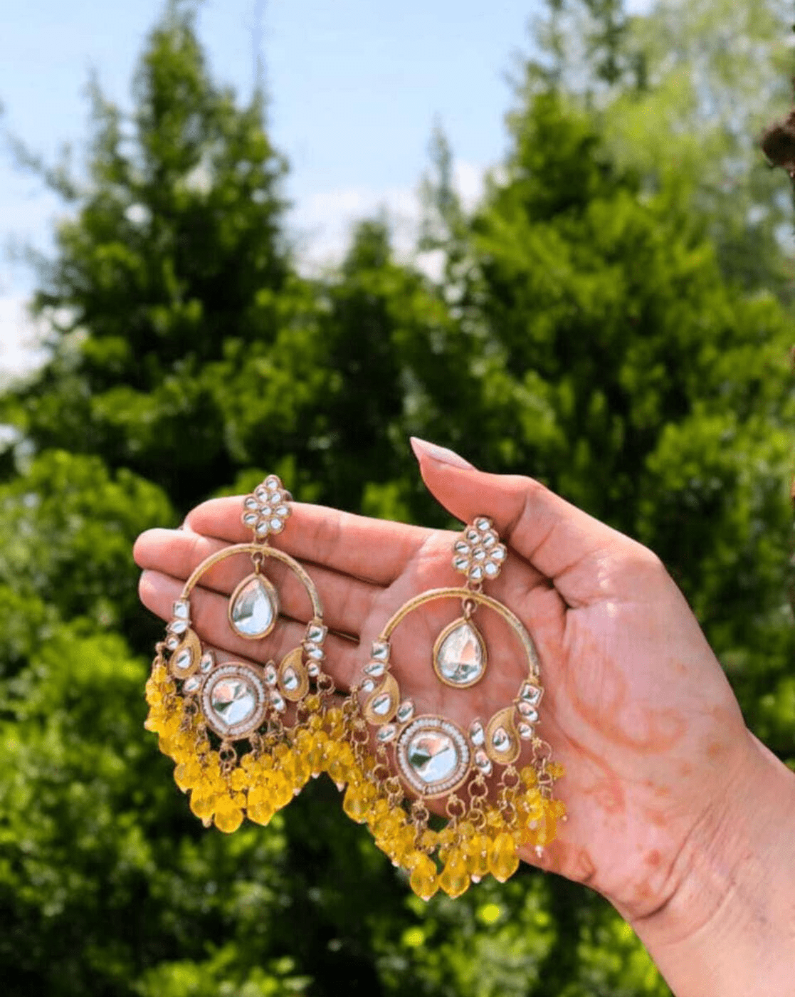 Women Gold - Plated Kundan - Studded Dangler Earrings - aromie