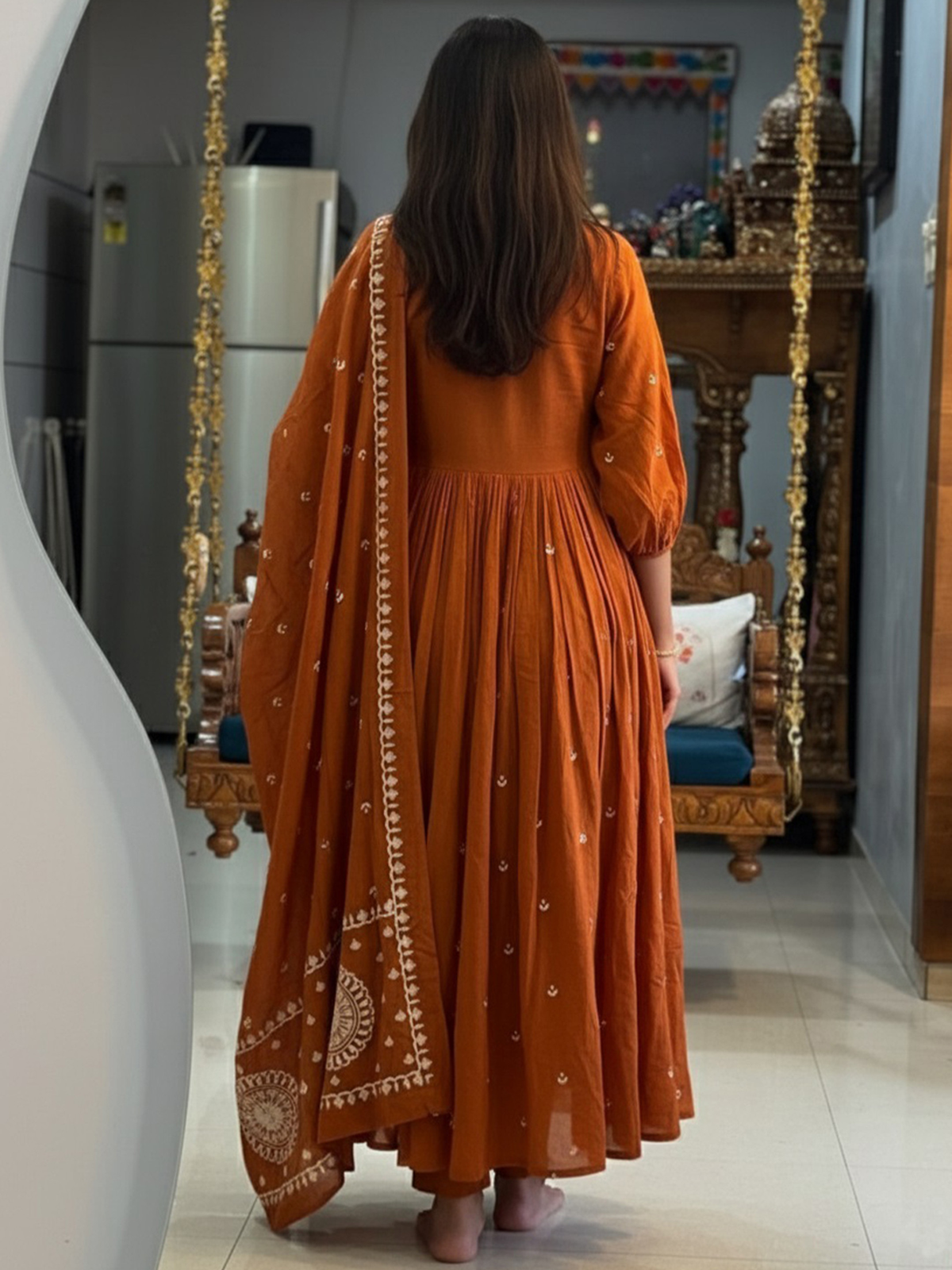 Women printed kurta set Canada in orange with intricate embroidery and flowy design