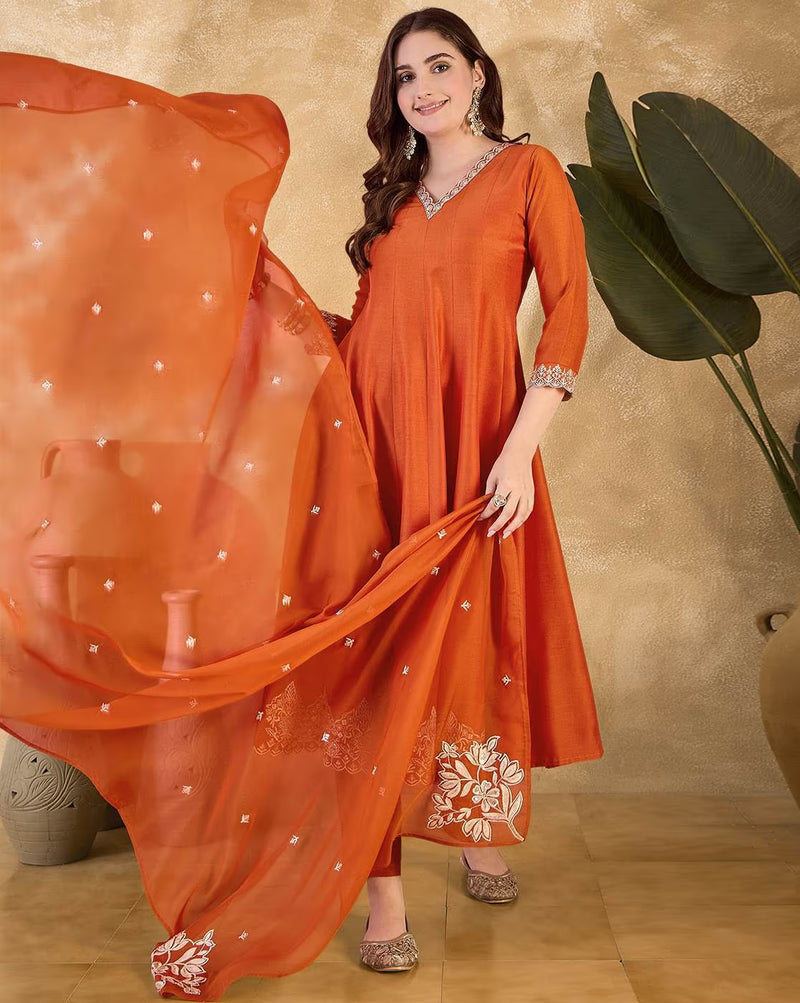 Women v-neck a-line kurta suit set in vibrant orange with elegant embroidery and flowy dupatta