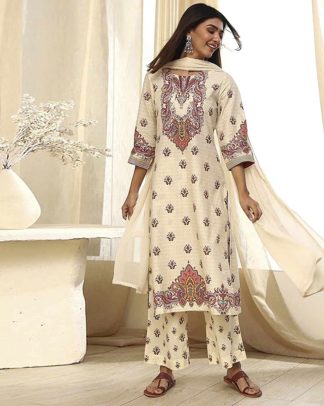 Elegant women's rayon kurta set featuring intricate embroidery and flowy design for casual wear