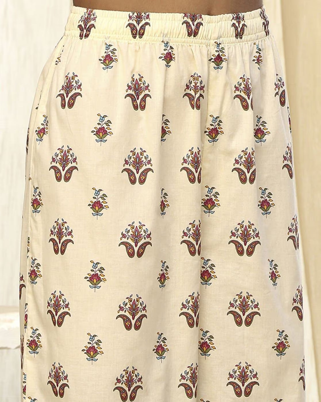 Close-up of women's rayon kurta set with floral print and comfortable elastic waistband for everyday wear