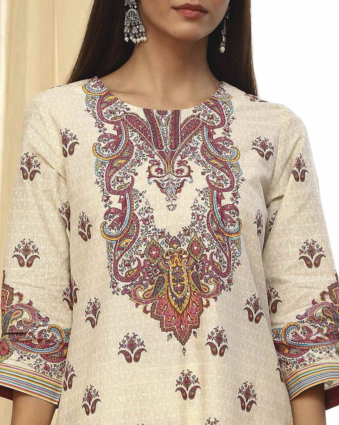 Elegant women's rayon kurta set with intricate paisley print and three-quarter sleeves