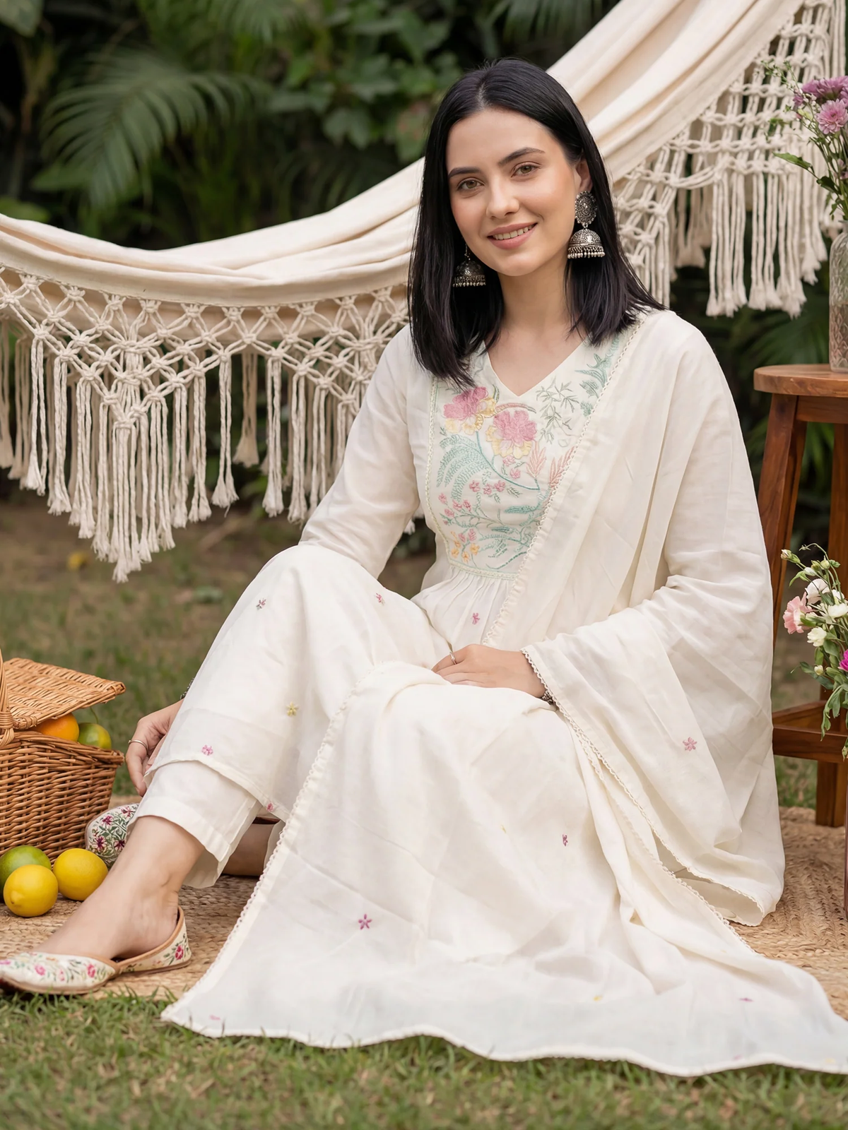 Women's white Zari embroidery kurta set Canada with floral design, perfect for casual outings and festive occasions