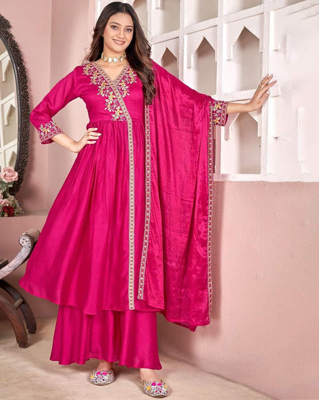 Women's Zari embroidery kurta set in vibrant pink with embellishments and elegant styling