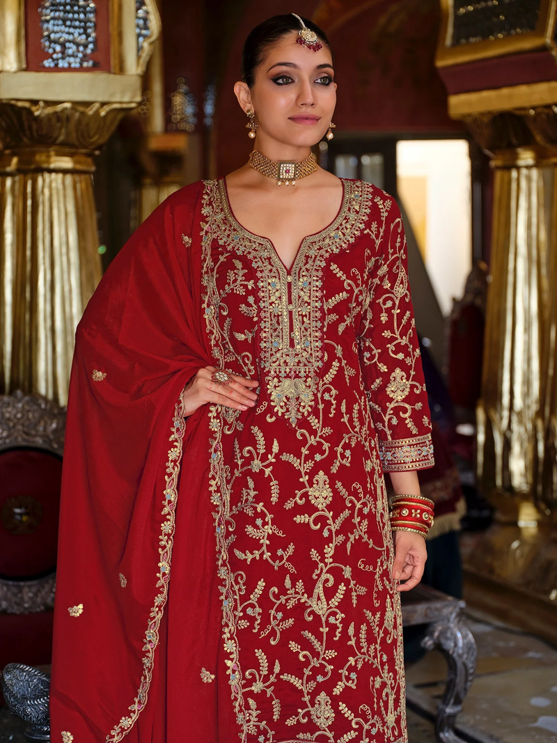 Front view of a red women's dress with Zari embroidery kurta set, perfect for weddings and festive occasions.